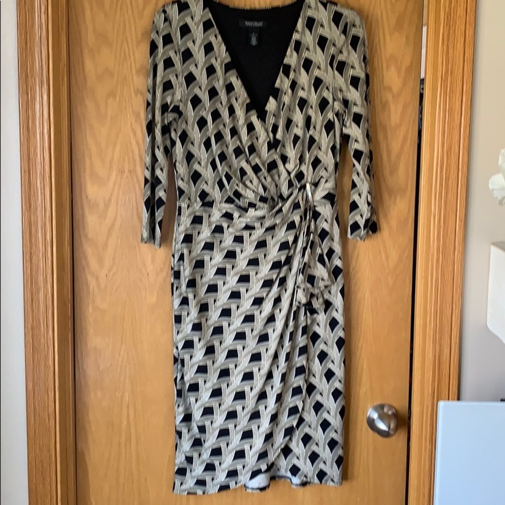 Black and ivory wrap dress gold buckle detail.